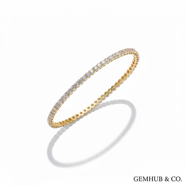 14k yellow gold tennis bracelet with 3.80 carats of round natural diamonds