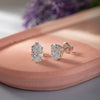 GEMHUB & CO. pair of oval lab-created diamond stud earrings in 950 platinum with screw backs.