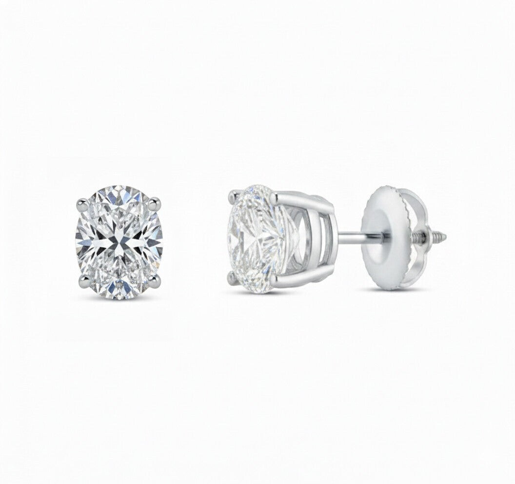 GEMHUB & CO. 3 Ct oval lab-created diamond stud earrings in 950 platinum with screw backs. IGI certified.