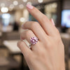 GEMHUB & CO. 2.55ct round pink moissanite solitaire ring with pavé band in 18K gold plated sterling silver.