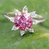 GEMHUB & CO. 2.5ct round pink moissanite solitaire ring with small accent stones, 18K gold plated over sterling silver.