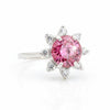 GEMHUB & CO. 2.5ct pink moissanite solitaire ring with surrounding white accent stones, set in 18K gold plated vermeil.