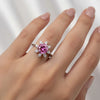 GEMHUB & CO. 2.5ct pink moissanite solitaire ring with surrounding white accent stones in 18K gold plated vermeil.