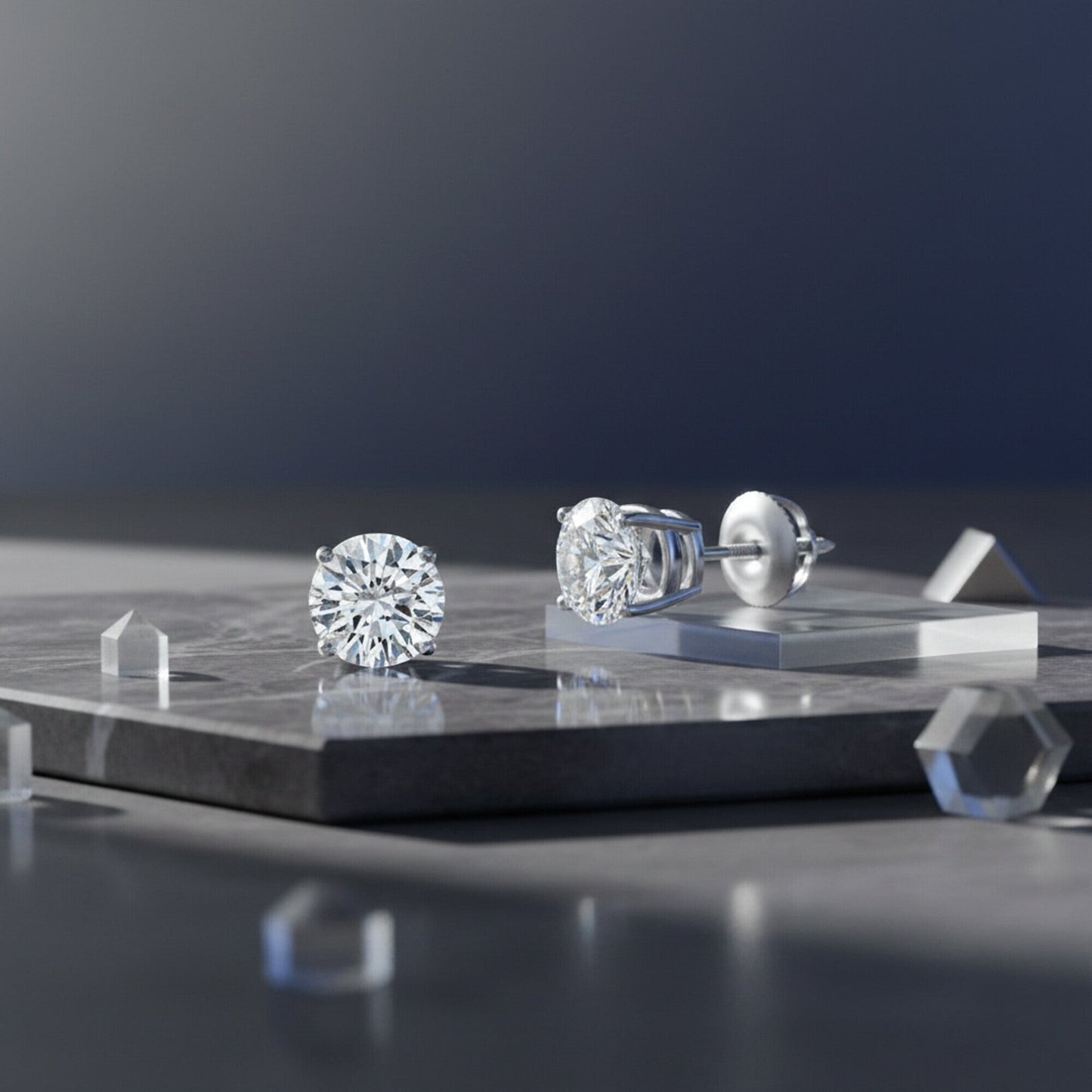 GEMHUB & CO. 1 Ct round lab-created diamond stud earrings in 950 platinum with screw backs. IGI certified.