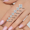 GEMHUB & CO. 1 Ct princess cut lab-created diamond earrings in 950 platinum with screw backs shown on a hand.