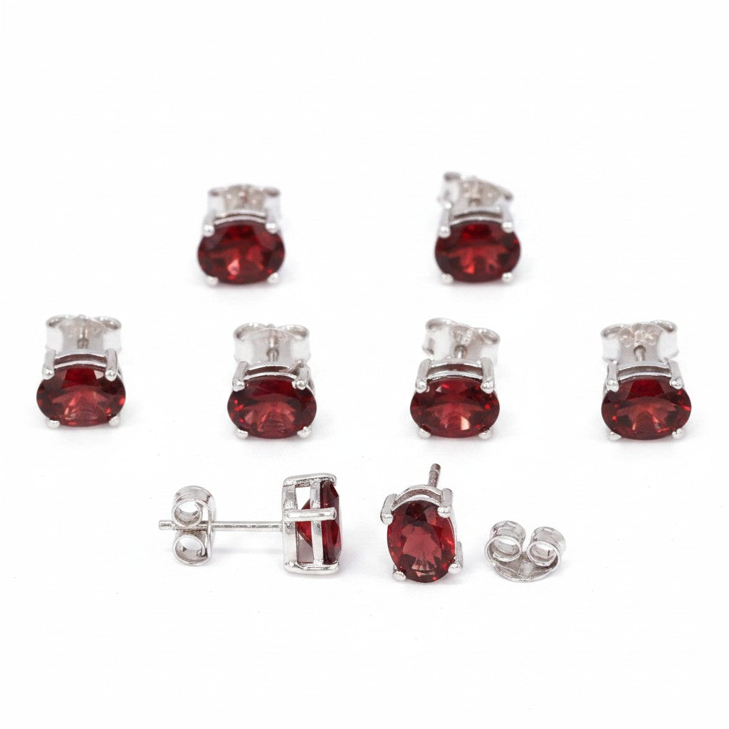 GEMHUB & CO. 5 pairs of oval-cut red garnet stud earrings in 925 sterling silver.