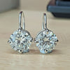 GEMHUB & CO. 5.00 Ct white moissanite solitaire dangler earrings in gold vermeil with round cut.