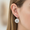 GEMHUB & CO. 5.00 Ct white moissanite solitaire dangler earrings in gold vermeil over sterling silver.